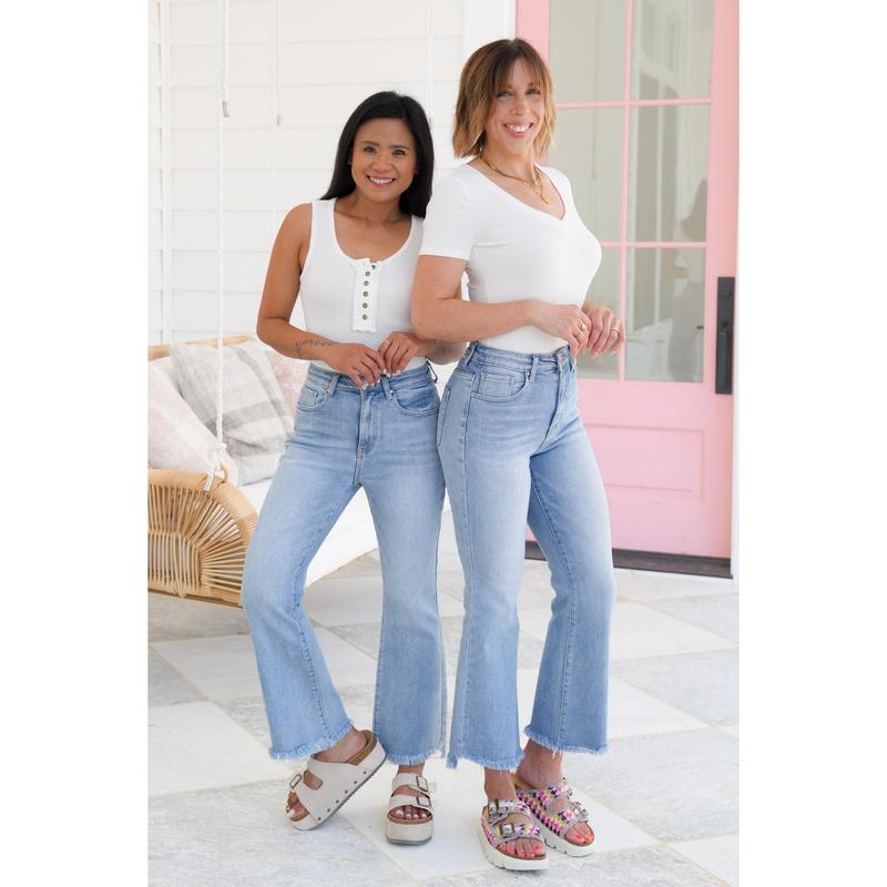 Risen High Rise Light Wash Cropped Flare Jeans With Frayed Hem