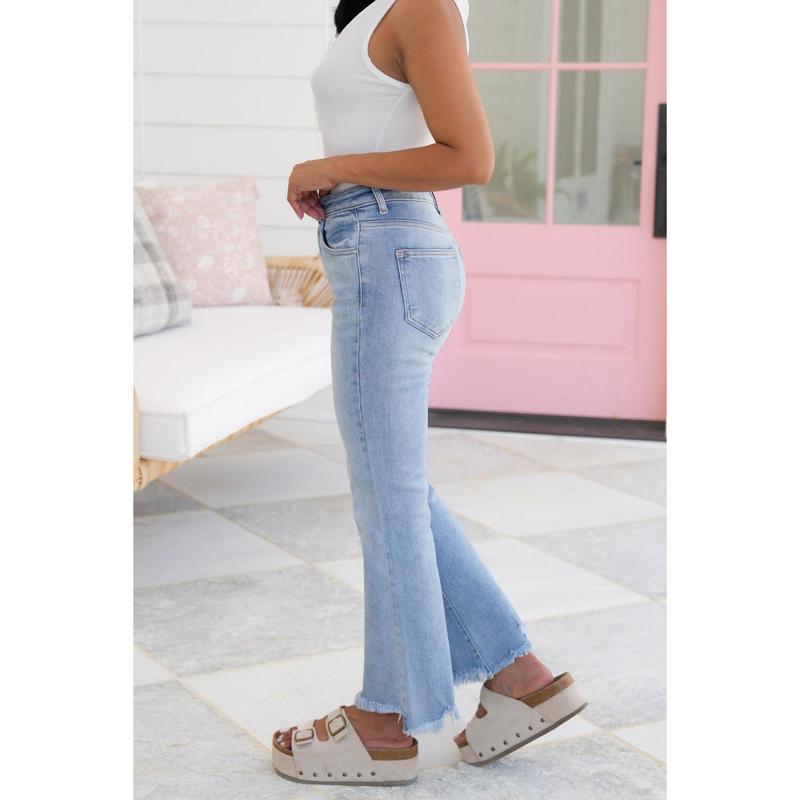Risen High Rise Light Wash Cropped Flare Jeans With Frayed Hem